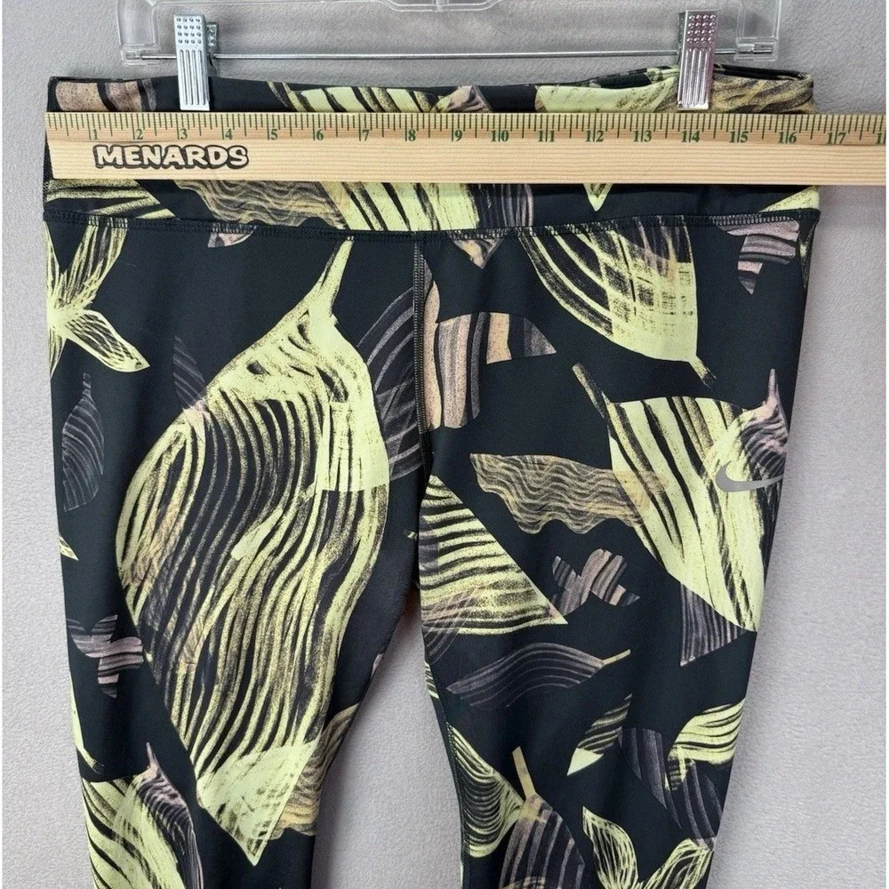 Nike‎ Yoga Dri-Fit Women's Black Yellow Medium Swirl Drawstring Ankle Legging